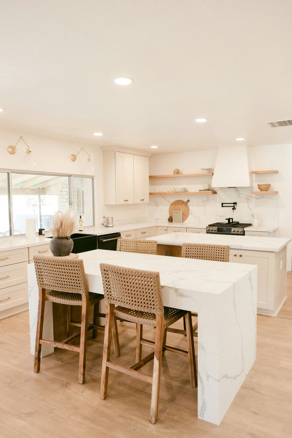 Farmhouse-style kitchen with off-white painted walls and timber shelving